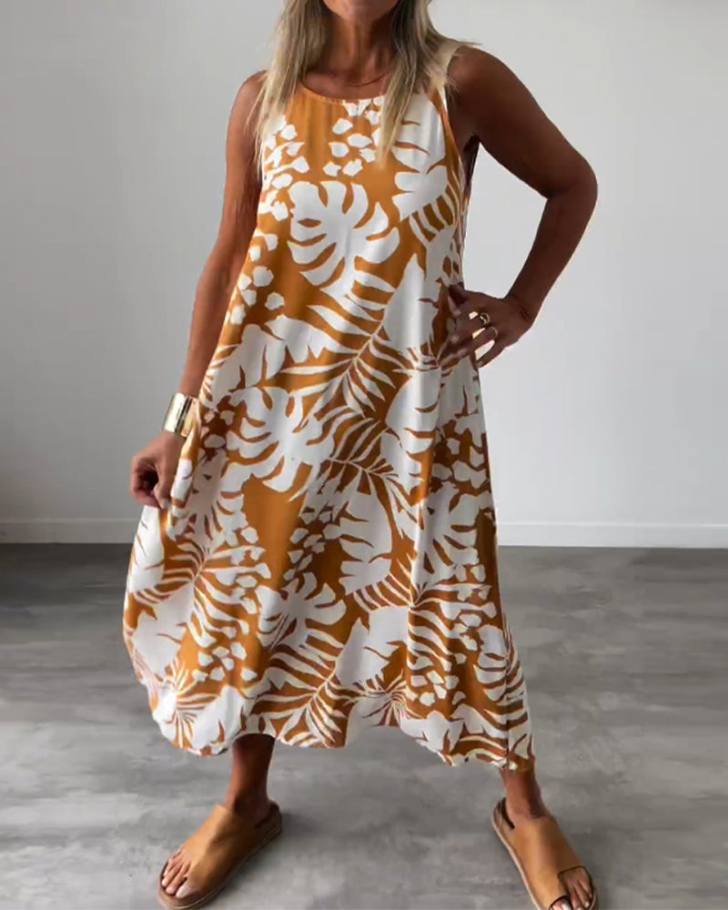 LUCY | ELEGANTE MOUWLOZE JURK MET BLADPRINT